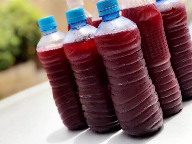 Bottles of homemade hibiscus (Zobo) drink