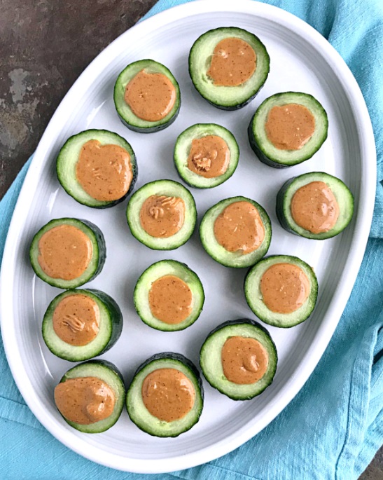 Cucumber slices with groundnut paste topping