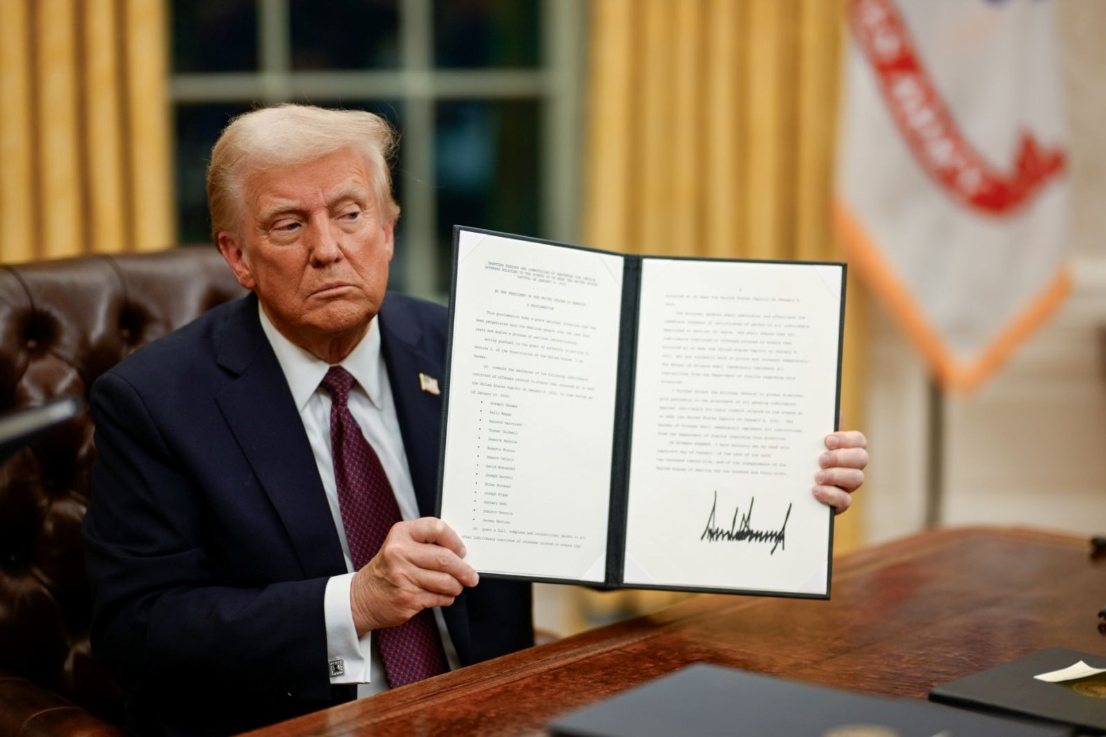 Prsident DJ Trump showcasing signed executive order