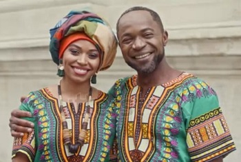 A happy African couple in colourful top wear