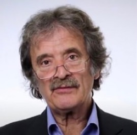 John Buckels, MB ChB, FRCS (Eng), MD, CBE